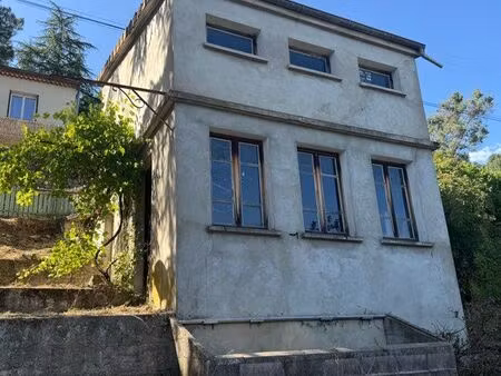 terrain constructible 350 m2 + garage 25m2 + local 25m2