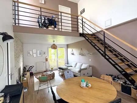 duplex f3 avec 2 terrasses - bon état général - 2 places de parking en sous-sol - petite c
