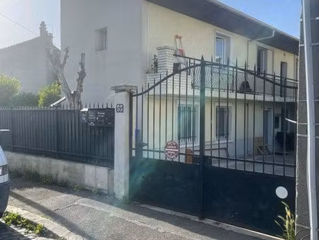 maison divisé en 4 appartements