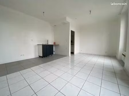 bâtiment locatif de 4 appartements