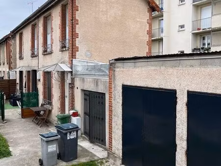 immeuble composé de 2 appartements