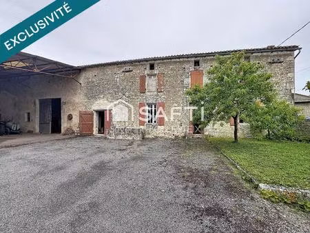 maison en pierre avec grange attenante à rénover