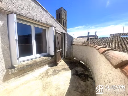 maison de village avec toit-terrasse