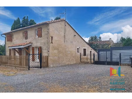 maison en pierre avec double garage