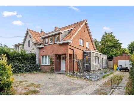 halfopen bebouwing met bijgebouw en veel potentieel te koop in bonheiden