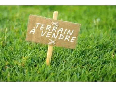 auros - terrain en plein centre-ville
