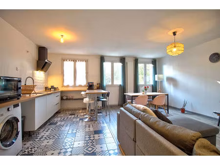 agen - appartement de 57m² avec 2 chambres et place de parking privative.