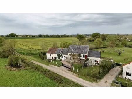 propriété de caractère sur grand terrain arboré