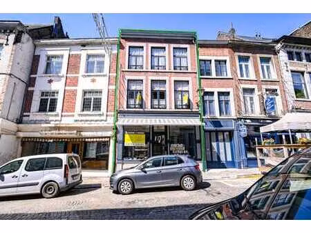 magnifique bâtisse centre huy avec garage!