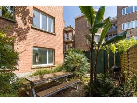 appartement art déco avec jardin exotique