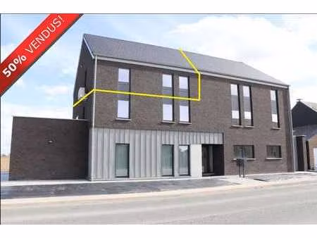 luxueux appartement neuf  2 ch. avec grand grenier et cave.