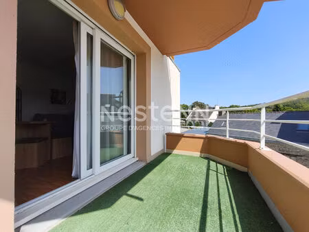 appartement t2 à vendre à saint nolff - proche commerces et écoles - parking - cave