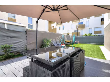 bezons - appartement familial 4 pièces en rez-de-jardin avec terrasse et jardin privatif