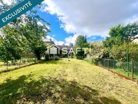 maison à rénover de 76 m² avec garage et jardin