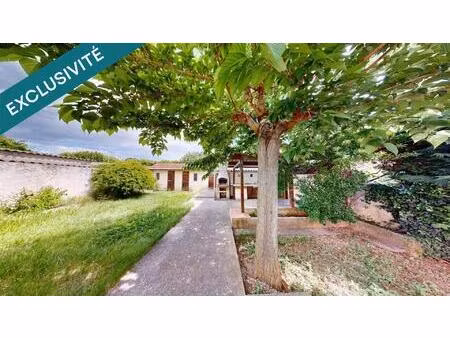 maison spacieuse avec garage et jardin