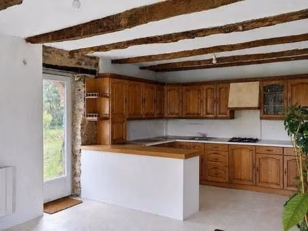 belle maison mitoyenne  offrant de beaux volumes ainsi qu'un fort potentiel de personnalis