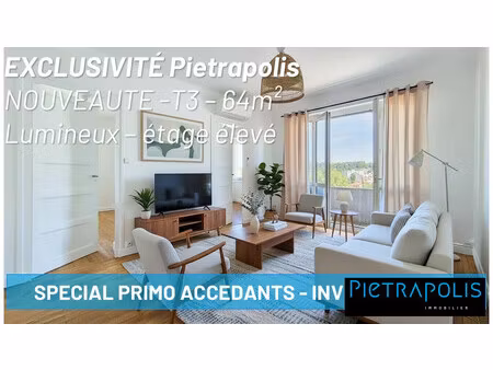 lyon 8 - t3 de 63.81m² avec balcon au 4ème ét/7- ascenseur -
