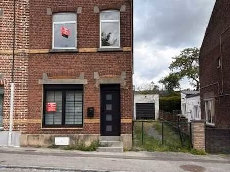 maison trois façades avec garage