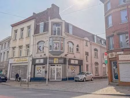 bel immeuble de rapport avec 2 appartements et 1 rdc com.