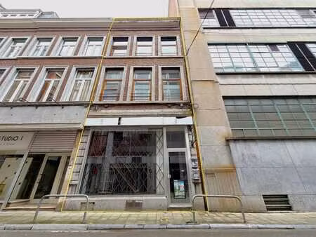 immeuble avec rez commercial + duplex 2 chambres