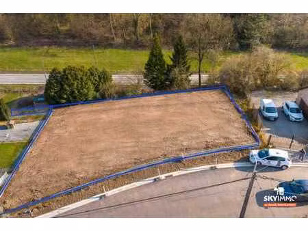 superbe terrain 1260 m² environnement verdoyant