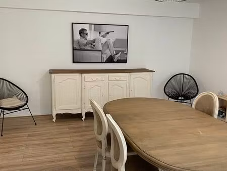 appartement trois pieces 78 m2 avec un garage  une place de parking et une terrasse