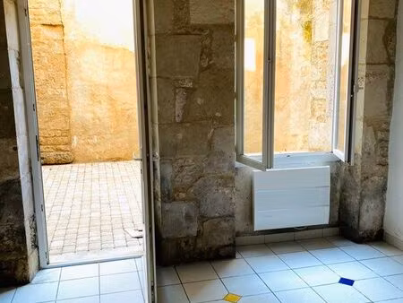 appartement de 90m2 avec cour