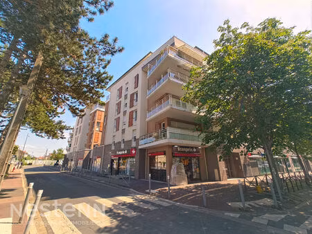appartement ermont centre-ville 3 pièce(s) 66.23 m2 avec grand balcon et double box - rési