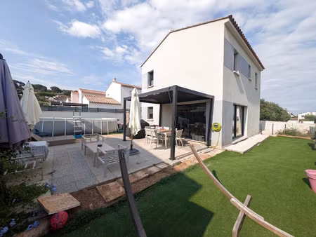 maison t5 avec 4 chambres et garage dans un secteur recherch