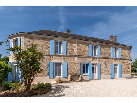 grande maison bourgeoise et son jardin secret : élégance et authenticité