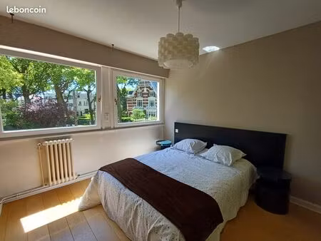 location grand t2/t3 + garage fermé + terrasse + place de parking