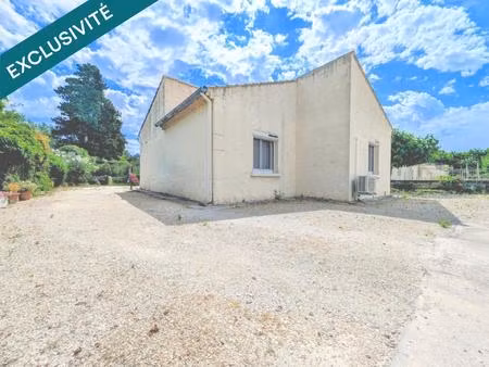 maison de plain-pied avec garage et jardin