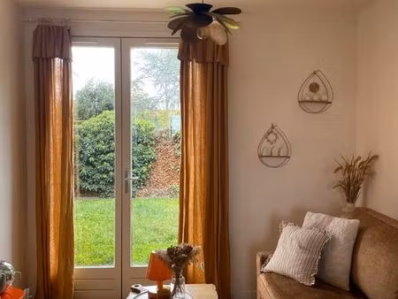 appartement t2+ cave en rez-de-jardin en centre ville