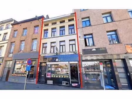 immeuble de rapport : rez-com. + 3 logements