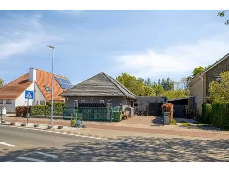 alleenstaande woning met zongerichte tuin te koop in dudzele
