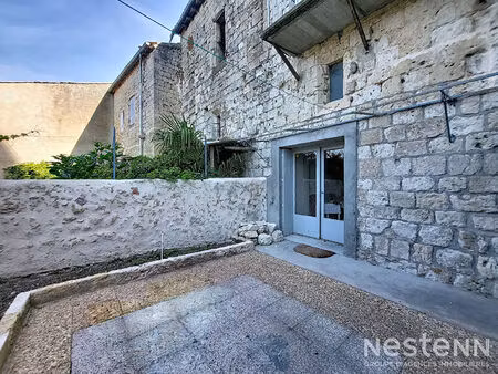 a vendre maison en pierre de 145 m² avec cour intérieure au coeur du village de la romieu