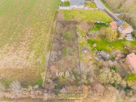 terrain de 1014m² dans le village de remicourt