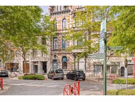 maison de maître (6 appartements  bureau + parking)