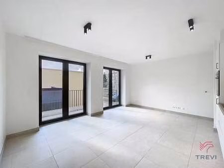 studio neuf avec terrasse dans un écrin verdoyant