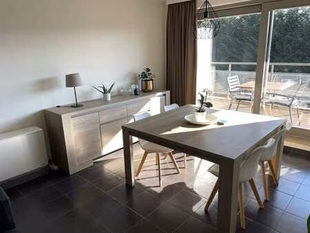 bel appartement 2 chambres avec cave et parking intérieur