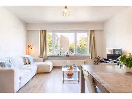 appartement 1 ch. + bureau/dressing  balcon + jardin commun