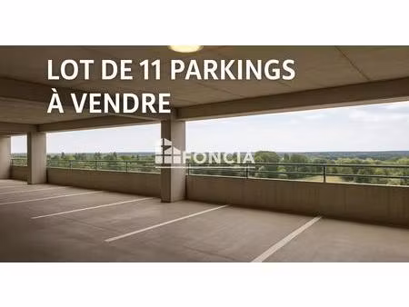 evry-courcouronnes - lot de 11 places de parkings intérieurs en silo