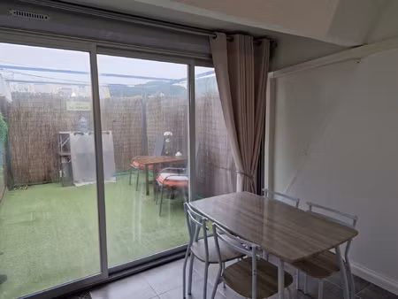 studio en rez de jardin avec parking
