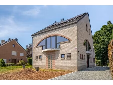 gebouw met twee appartementen op uitstekende ligging in humbeek met ruime tuin en parkeerm