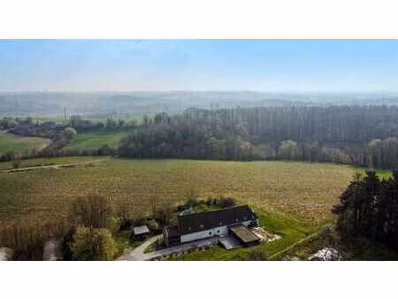 terrain à bâtir de 9 ares 95 ca dans un cadre verdoyant