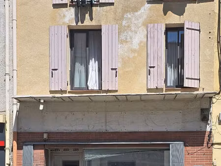 spécial investisseur : local commercial vacant + appt loué