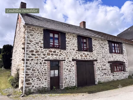 adorable maison en pierres  avec jardinet  cave et garage. a