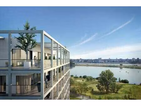 tweeslaapkamerappartement in groene parksite aan zeilmeer