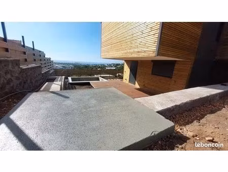 villa neuve de 140m² avec piscine et vue mer (moulin joli  la possession)