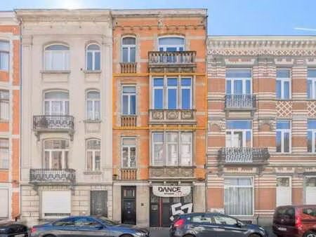 cinquantenaire - app 1ch de +/-70m² - petite copro